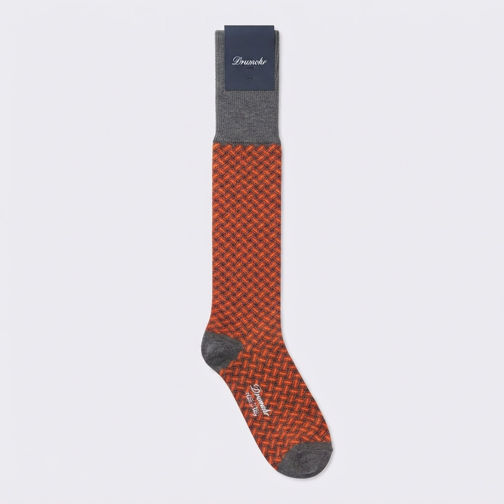 Calza lunga Drumohr in cotone grigio con biscottini arancio