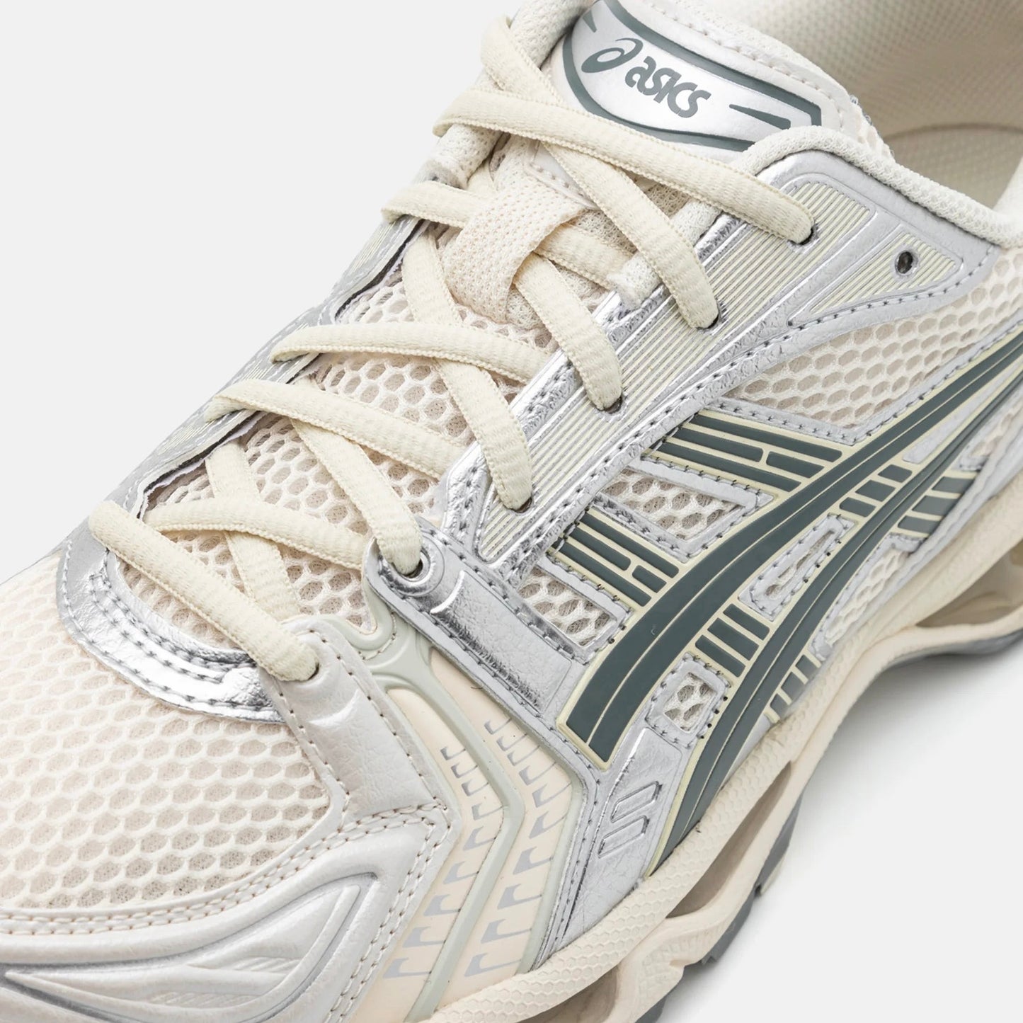 Asics Gel Kayano 14 running sneaker in cream fabric and green leather