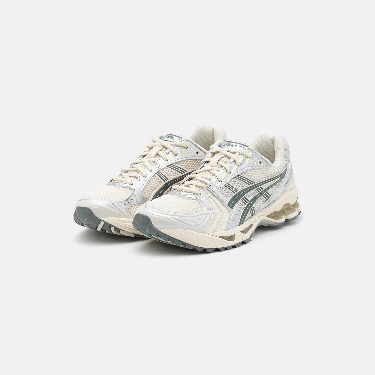 Asics Gel Kayano 14 running sneaker in cream fabric and green leather