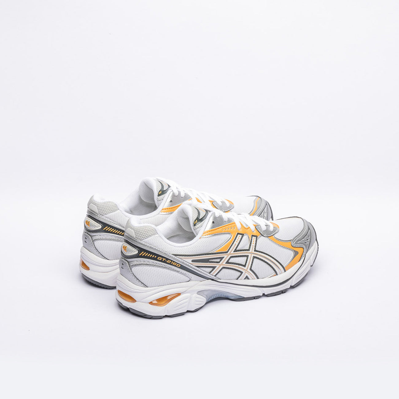 Sneaker running Asics GT-2160 in tessuto bianco e pelle arancione