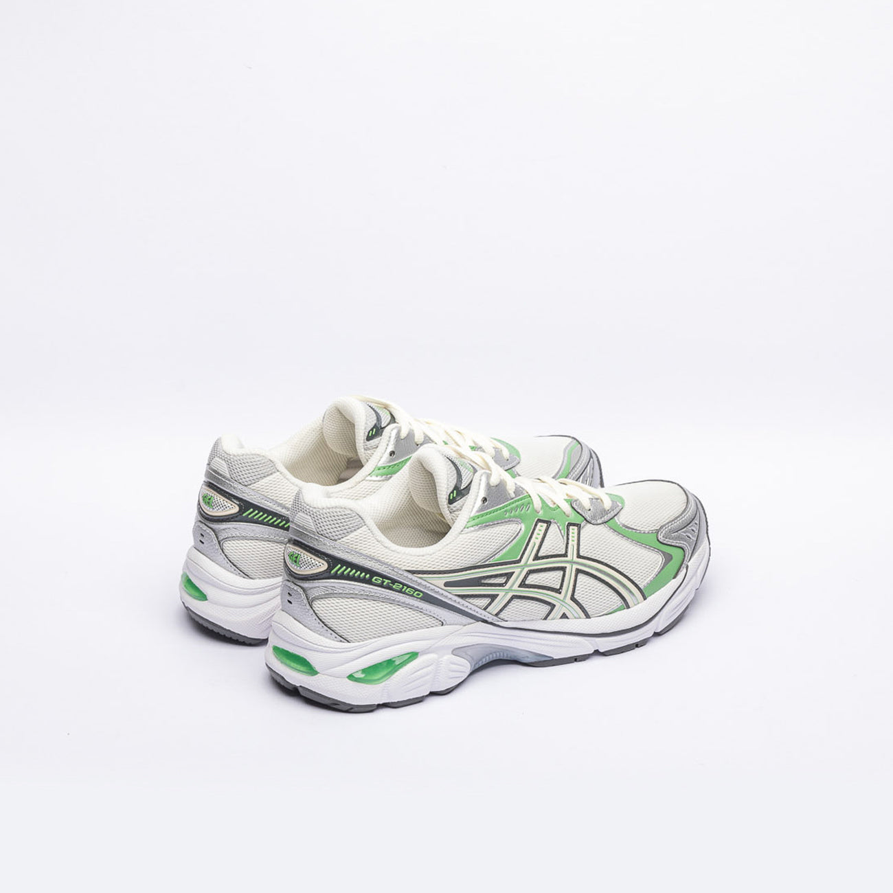 Sneaker running Asics GT-2160 in tessuto bianco e pelle verde